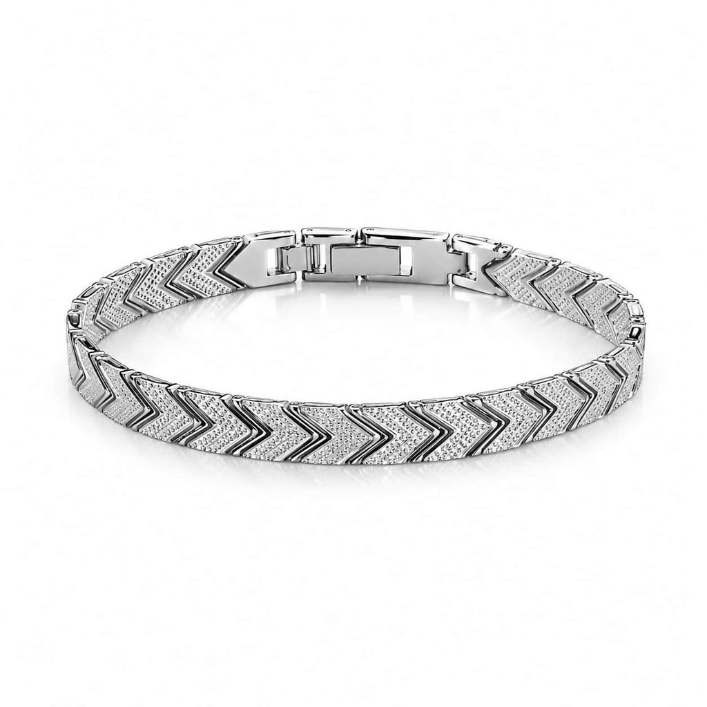 A silver-toned chevron-patterned bracelet with a polished rectangular clasp, displayed on a clean white background.